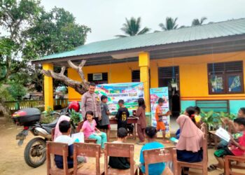 Bhabinkamtibmas BRIPKA Rico Surya Ardana D, SH: Mendorong Literasi dan Kedekatan Polisi dengan Anak-Anak