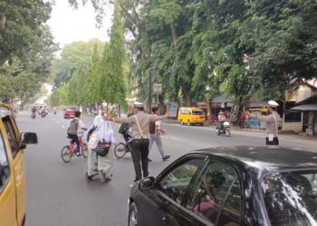 Personil Polres Langkat Laksanakan Strong Point, Cegah Laka Lantas